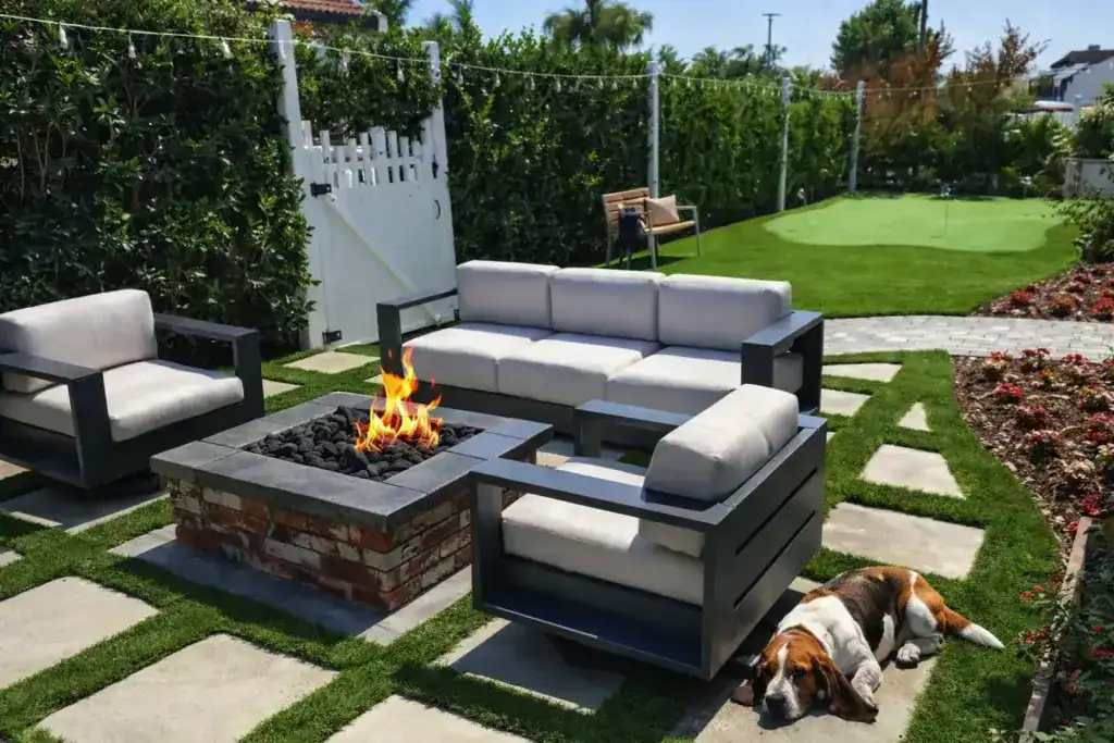 Artificial grass patio with fire pit seating area and backyard putting green