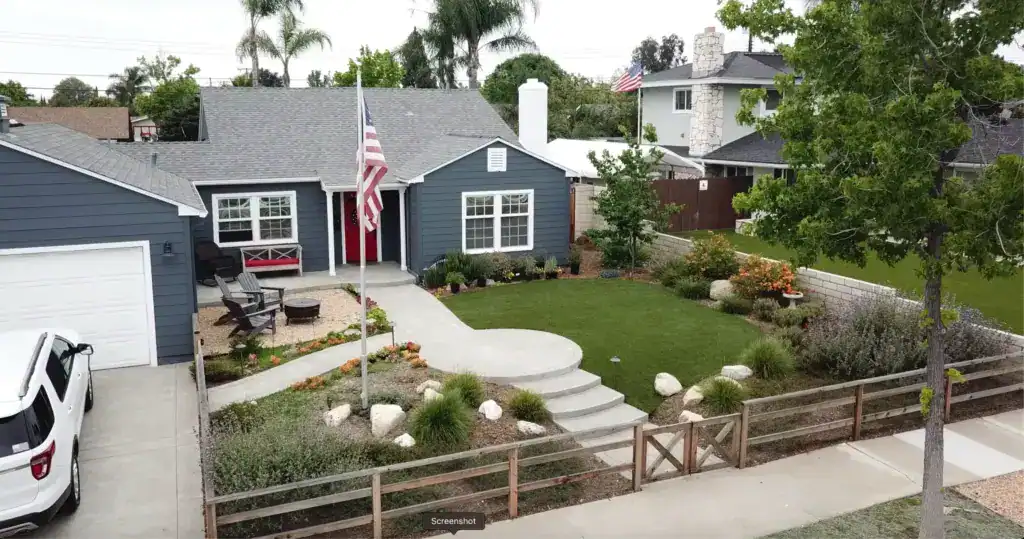 Artificial grass installation by Ecoworkz in Corona, California — combining low-maintenance turf with native plants for a clean, sustainable front yard design.